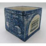 A Troika cube decorated with abstract designs, height 8.5cm.