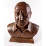 A carved wood male portrait bust, height 45cm.