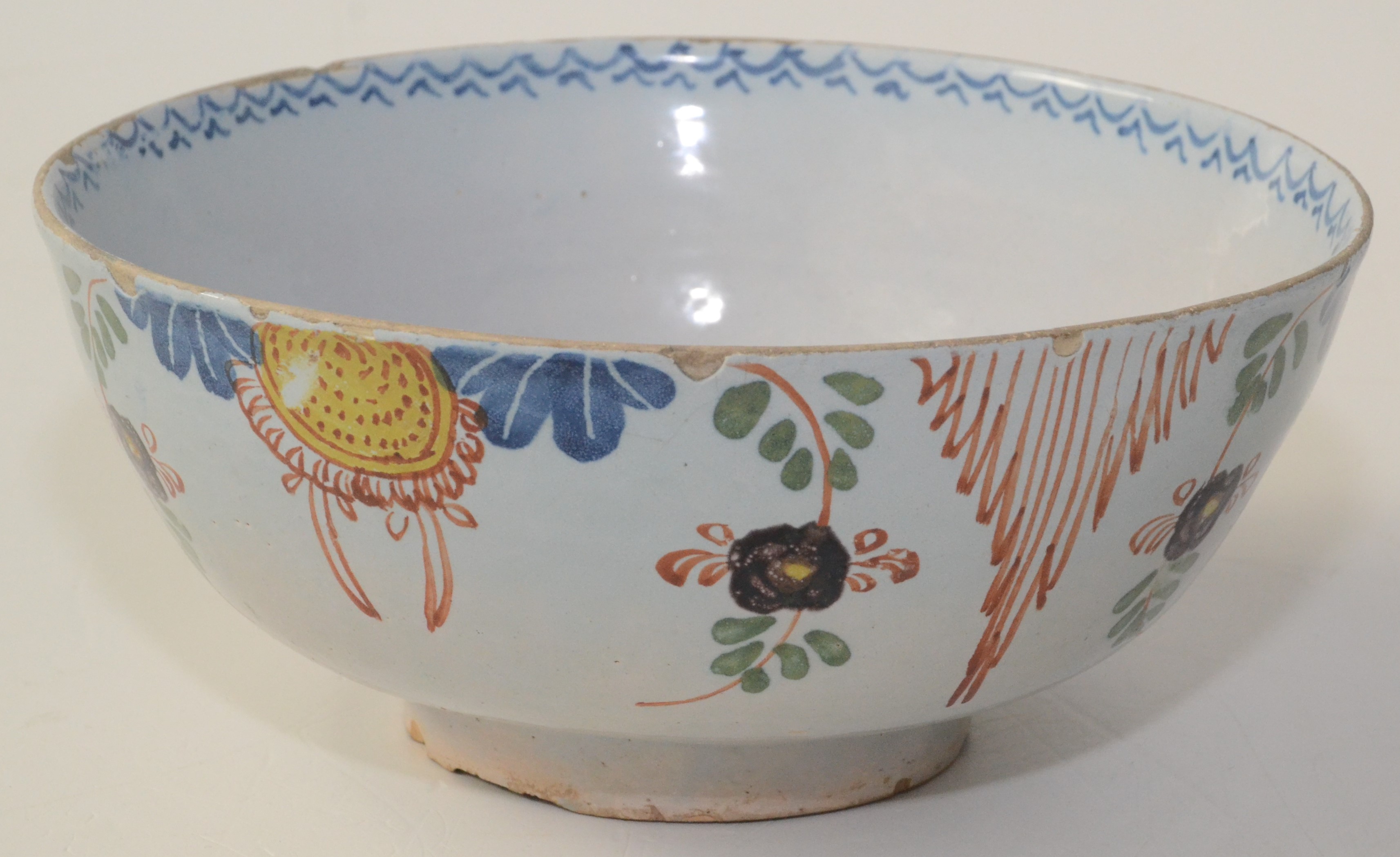 An English delft pottery polychrome bowl, bearing the label 'C18th Bristol', diameter 19cm,