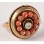 A Victorian gold, coral and pearl ring. Condition report: Unmarked.