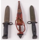 A US M7 Conetta knife bayonet, the partial double edged blade measuring 16.