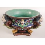 A large majolica jardiniere, decorated with lion masks,