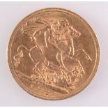 A George V sovereign dated 1912, extremely fine.