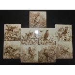 Nine Minton pottery tiles, of square section, decorated with birds, 15.5cm.