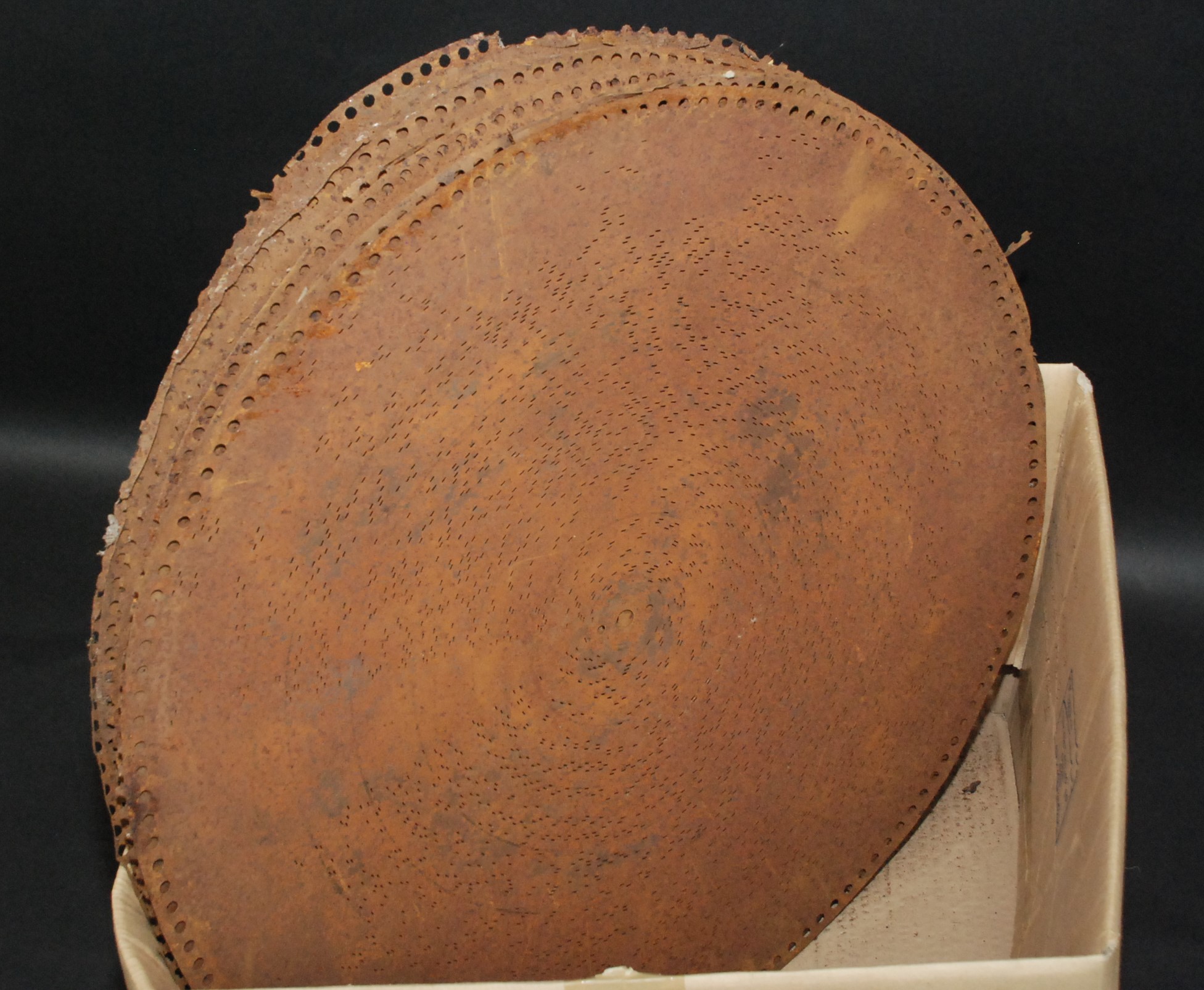 A quantity of polyphone discs and others, largest diameter 63.5cm.