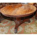 A crossbanded Victorian mahogany snap top table,