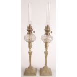 A pair of brass peg oil lamps, late 19th/20th century,