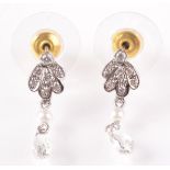 A pair of earrings,