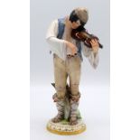 A Meissen porcelain figure of a gypsy violinist, 19th century, incised R127 and blue crossed swords,