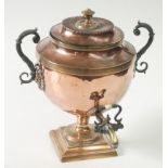 A copper tea urn early 19th century,