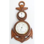 A late 19th/early 20th century clock barometer, the oak case in the form of an anchor,