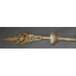 An Islamic brass pole arm, the brass head with calligraphy,