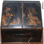 A Chinoiserie black japanned and gilt stationary cabinet,