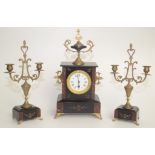 A black slate and marble three piece clock garniture with gilt metal mounts, height of clock 41cm.