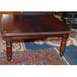 A mahogany extending dining table, 117 x 197cm with leaves inserted.