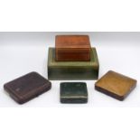 Five leather bound jewellery boxes.