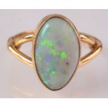 An 18ct gold ring set a large opal. Condition report: Ring size Q.