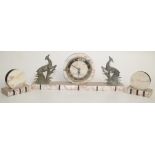 An Art Deco marble clock garniture, the circular dial with Roman numerals,