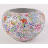 A Chinese porcelain millefiori bowl, densely painted with flowers on a white ground,