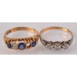 An 18ct gold sapphire and diamond ring, one diamond missing,