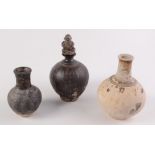 Khmer ceramics, three 12th-13th century brown glaze pots, heights 19cm, 16cm and 14cm.