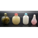 Four Chinese glass snuff bottles imitating hard stones, all with stoppers.