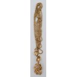 A delicate 10ct gold box link chain, 1.7g, and a butterfly pendant.