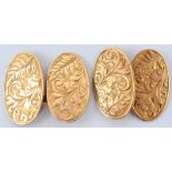 A pair of 9ct gold cufflinks with scrolling foliate engraving, 6g.