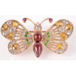 A modern gold butterfly brooch/pendant set diamonds and other precious stones,