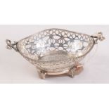 A Dutch silver sweetmeat basket with ribbon handles. 2.5oz.