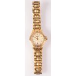 A Gucci ladies gold plated wristwatch, the case numbered 9240L.
