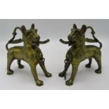 A pair of brass table lighters in the form of lion aquamanile by Adolph Frankau & Co, London,