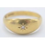 An 18ct gold ring gypsy set a diamond. Condition report: 4.