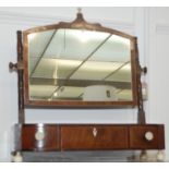 A George III mahogany toilet mirror, the arched glass with ivory finial,