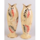 A pair of Arthur Wood vases, each with stylised leaf decoration on a cream crackle glazed ground,