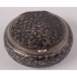 A Russian silver niello enamelled pill box.