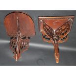 Two mahogany wall brackets, one height 38cm, the other height 41cm.