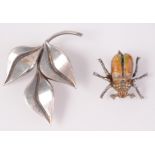 An enamelled silver beetle brooch and a Danish silver brooch by Christian Fogh.