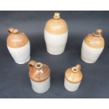 Five stoneware flagons, inscribed 'Richard Hicks, Plymouth', 'Clarke, Helston', 'M.