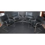 A set of four chrome and black leather chairs after Mart Stam.