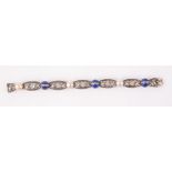 A fine Austrian silver bracelet with diamond banded lapis lazuli cabochons, pearls and leaf pierced,
