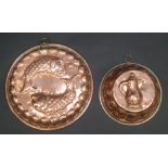 Two copper moulds.