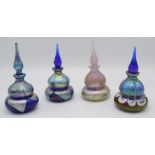 Four Okra iridescent glass scent bottles, '86 SPPSB 59', 86 SPPSB 58', 86 LPSB 69', 86 SePSB 22',
