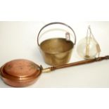 A Victorian brass preserve pan, with an iron handle, diameter 29.