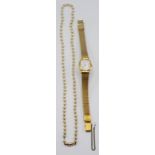 A cultured pearl necklace with gold clasp and a ladies watch.