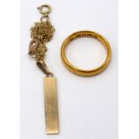 A 22ct gold band, 4.85g, together with a 9ct gold ingot pendant and chain, 2.3g.