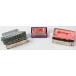 A Hohner 'Super Chromatic' harmonica, length 14cm, a German Koch chromatic harmonica and a M.