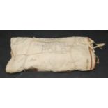 WWII, an officer's bedding roll complete with original blanket, the canvas bag inscribed 'Leut. J.