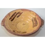 Peter Smith, a Studio Pottery part glazed twin handled bowl, diameter 25.5cm.