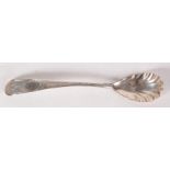 An Irish silver condiment spoon by John Daly.